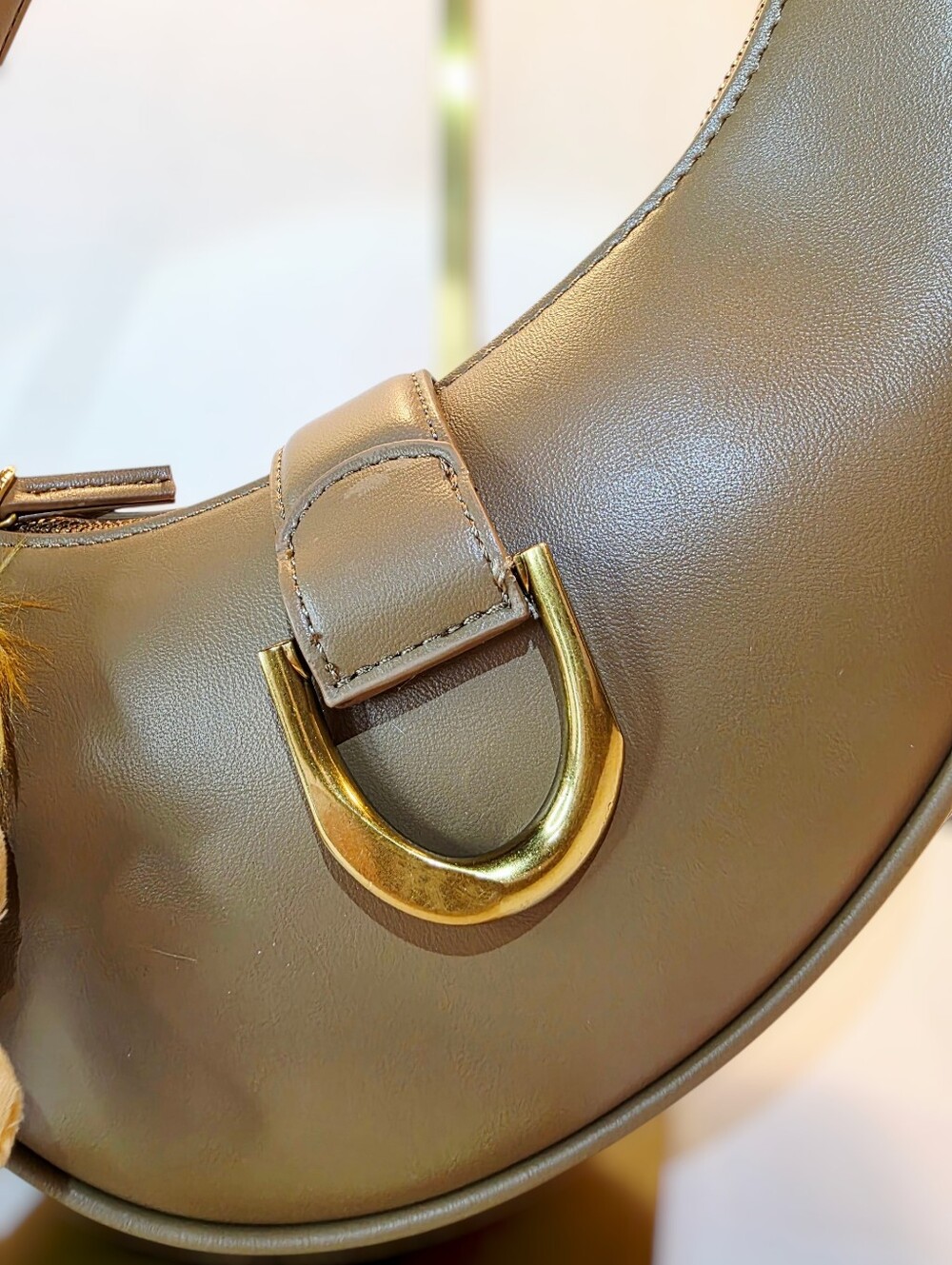 Asymmetric Crescent Shoulder Bag in Beige and Gold By Madison West - Picture 9 of 10